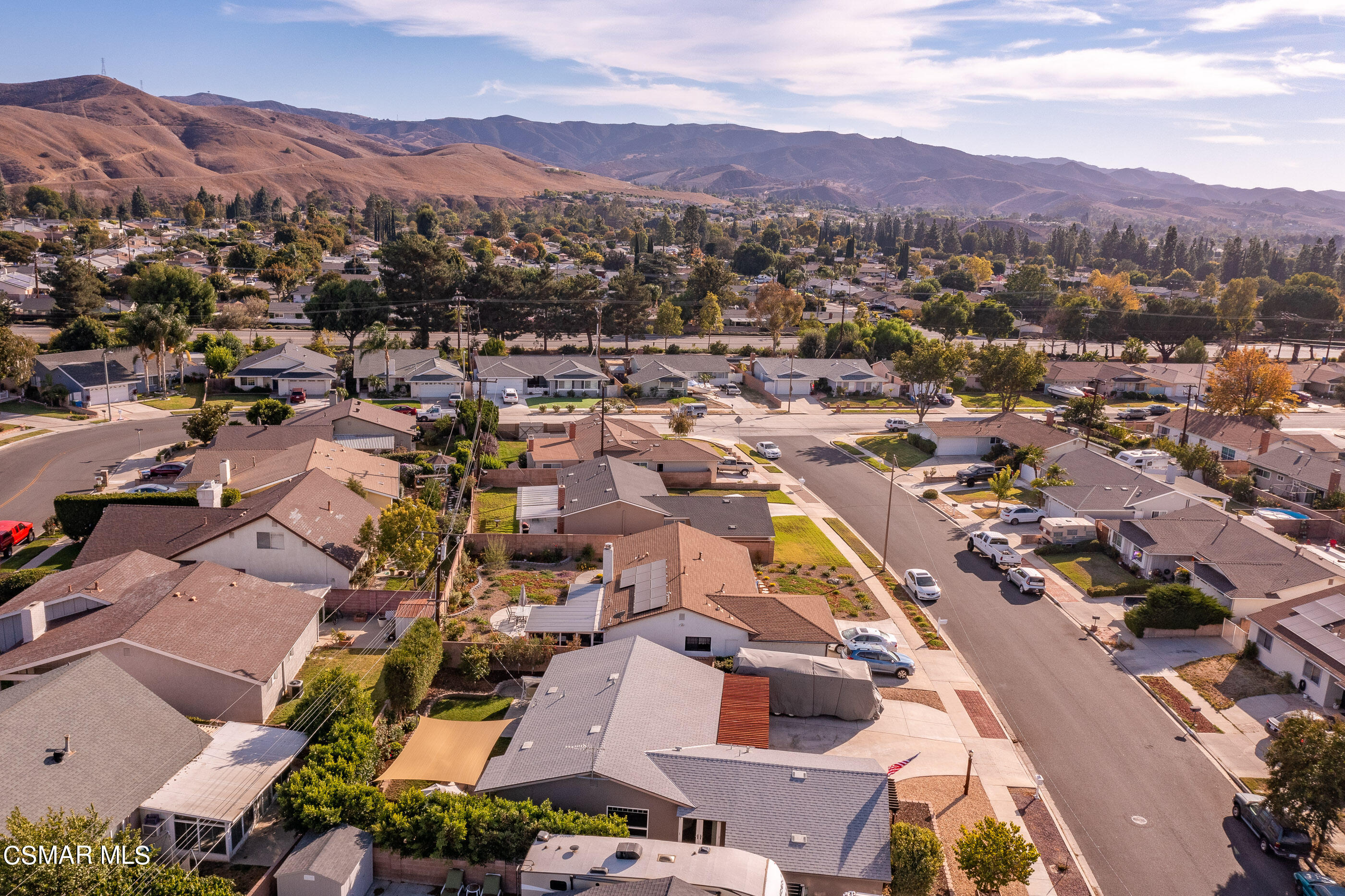 2066 Hurles Avenue Simi Valley, CA 93063 - Photo 46 of 50 an aerial view of a city with lots of residential buildings and mountain view in back