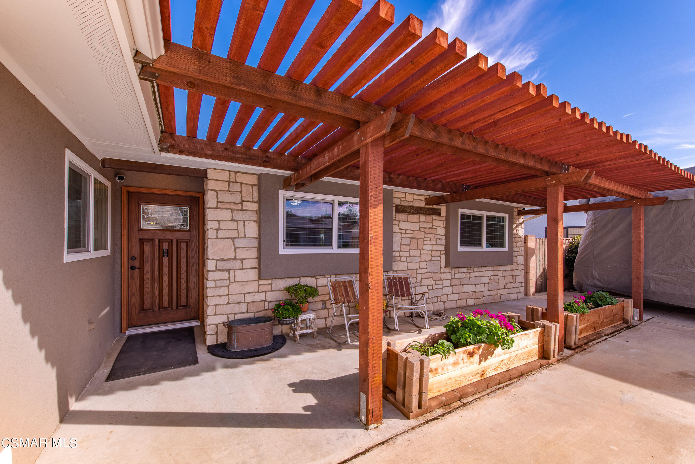 2066 Hurles Avenue Simi Valley, CA 93063 - Photo 50 of 50 a view of a porch with furniture and floor to ceiling window