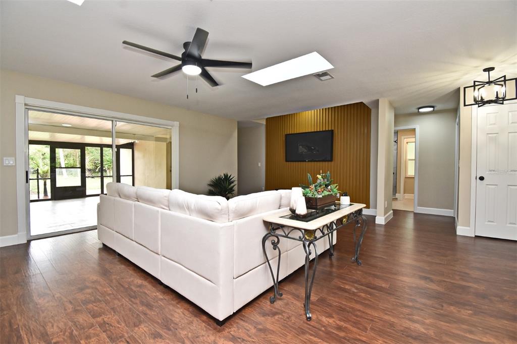 1444 Bird Road Casselberry, FL 32707 - Photo 13 of 70 a room with a bed and a table