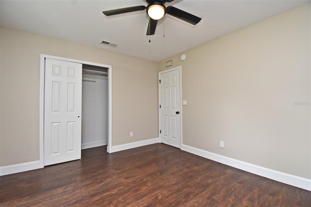 1444 Bird Road Casselberry, FL 32707 - Photo 30 of 70 a view of an empty room with wooden floor