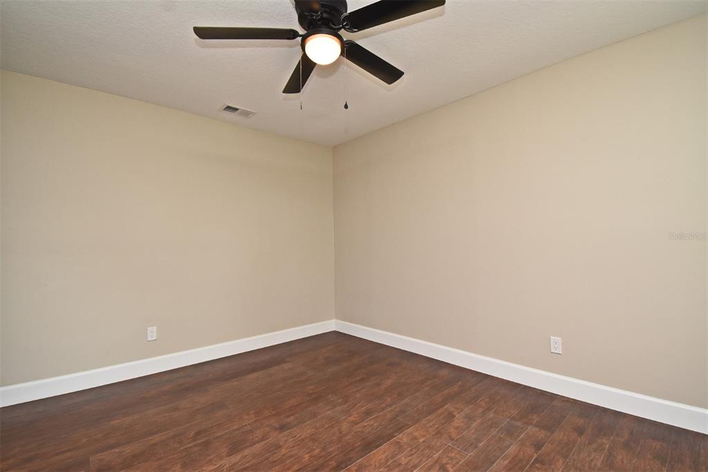 1444 Bird Road Casselberry, FL 32707 - Photo 34 of 70 wooden floor in an empty room