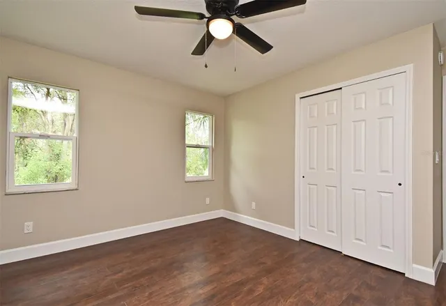 an empty room with windows