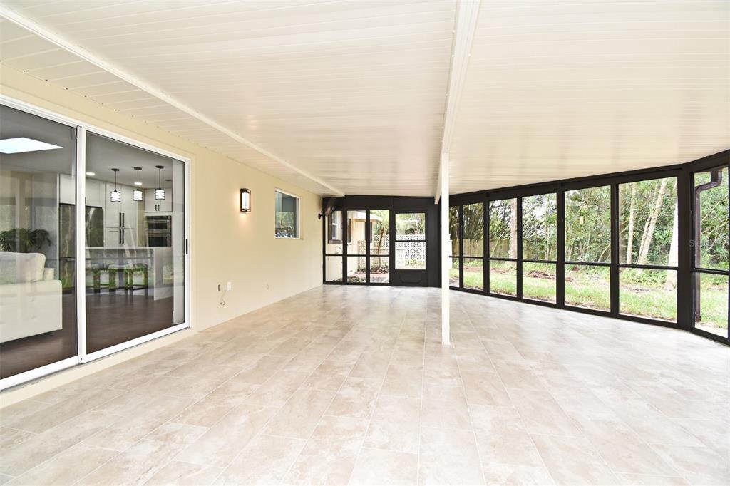 1444 Bird Road Casselberry, FL 32707 - Photo 41 of 70 a view of an empty room with glass door