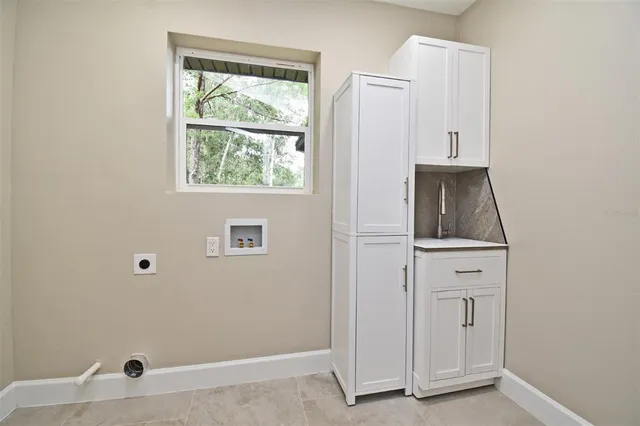 a view of an empty room with window