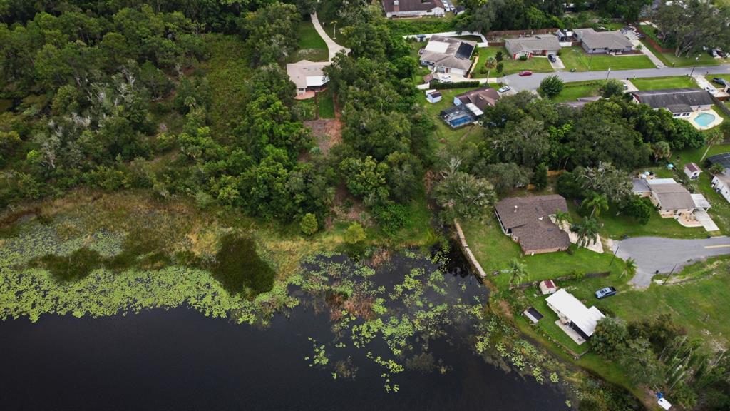 1444 Bird Road Casselberry, FL 32707 - Photo 63 of 70 an aerial view of residential house with outdoor space and trees all around