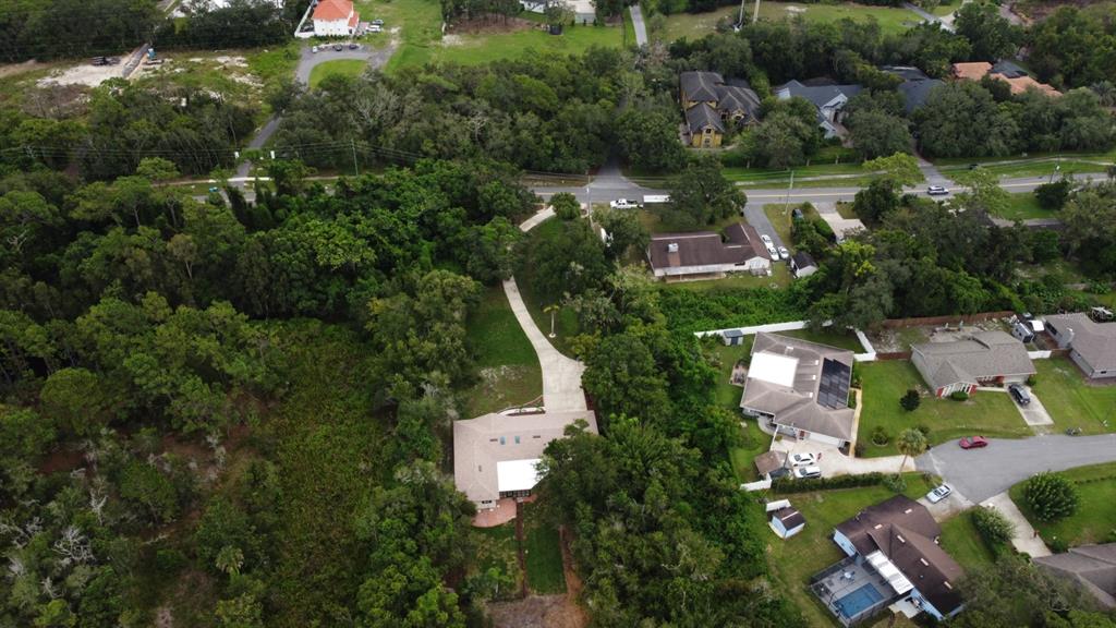 1444 Bird Road Casselberry, FL 32707 - Photo 66 of 70 an aerial view of a house with outdoor space and street view
