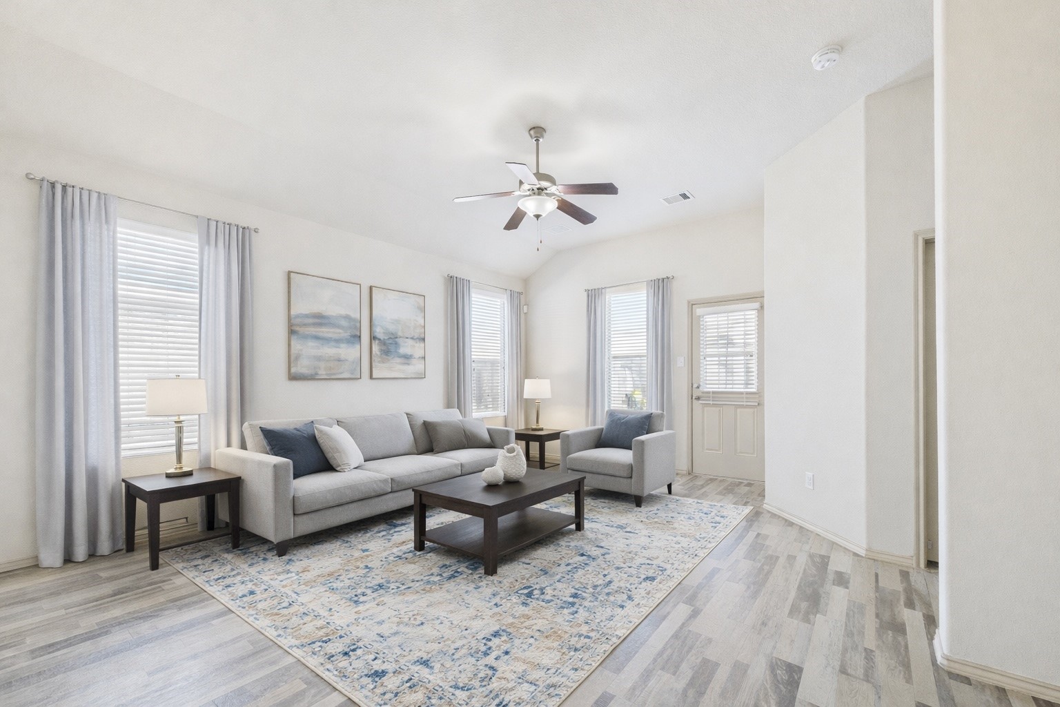 5206 Rosehill Ridge Court Katy, TX 77449 - Photo 7 of 20 A cozy living space with access to the backyard and windows on both walls.Virtually staged.