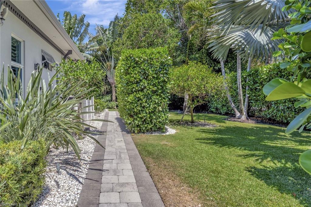 555 Mooring Line Drive Naples, FL 34103 - Photo 40 of 42 Side Yard, Garden