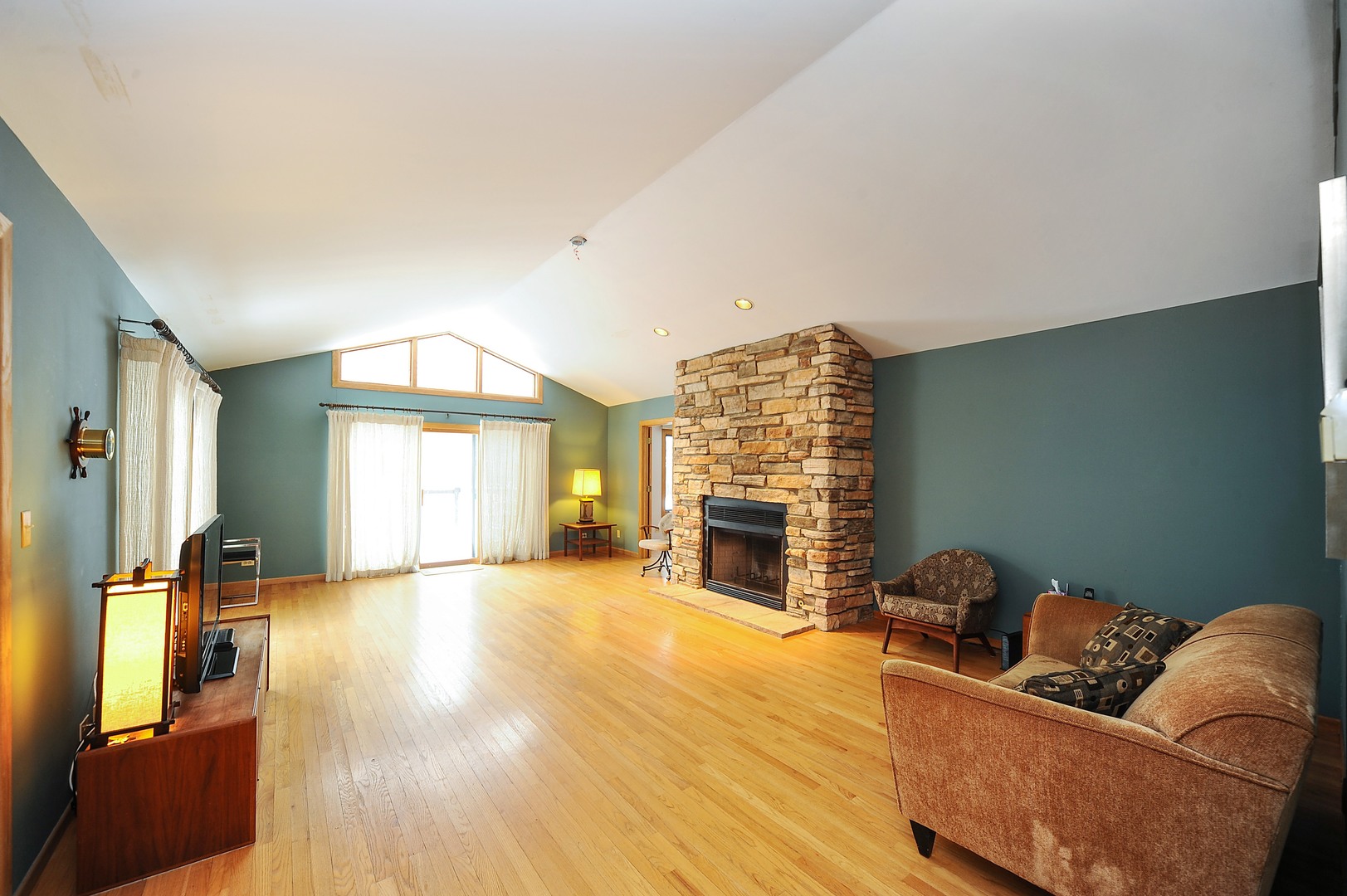 2120 Beechnut Road Northbrook, IL 60062 - Photo 5 of 10 a living room with furniture and a fireplace