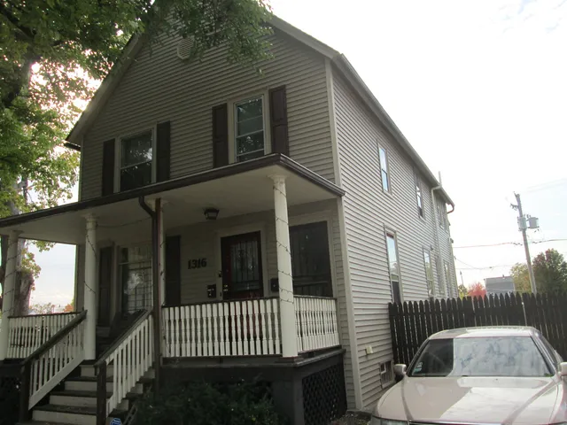 a view of a house with a porch