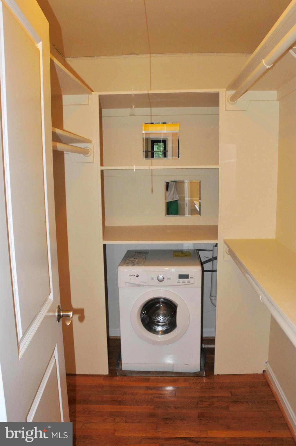 2725 39th Street Northwest, Unit 504 Washington, DC 20007 - Photo 13 of 18 LARGE WALK IN CLOSET WITH WASHER/DRYER COMBO