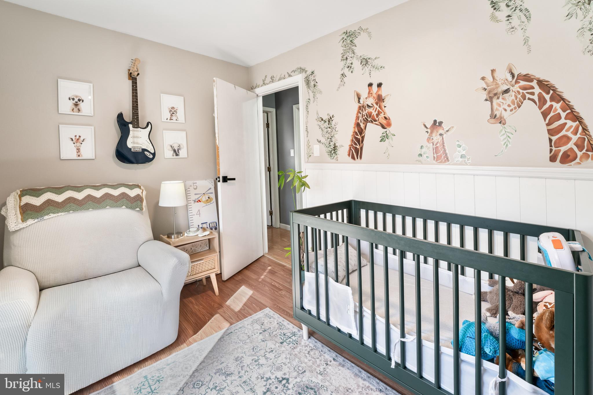 311 Tyler Avenue Carneys Point, NJ 08069 - Photo 15 of 29 a living room with furniture and wooden floor