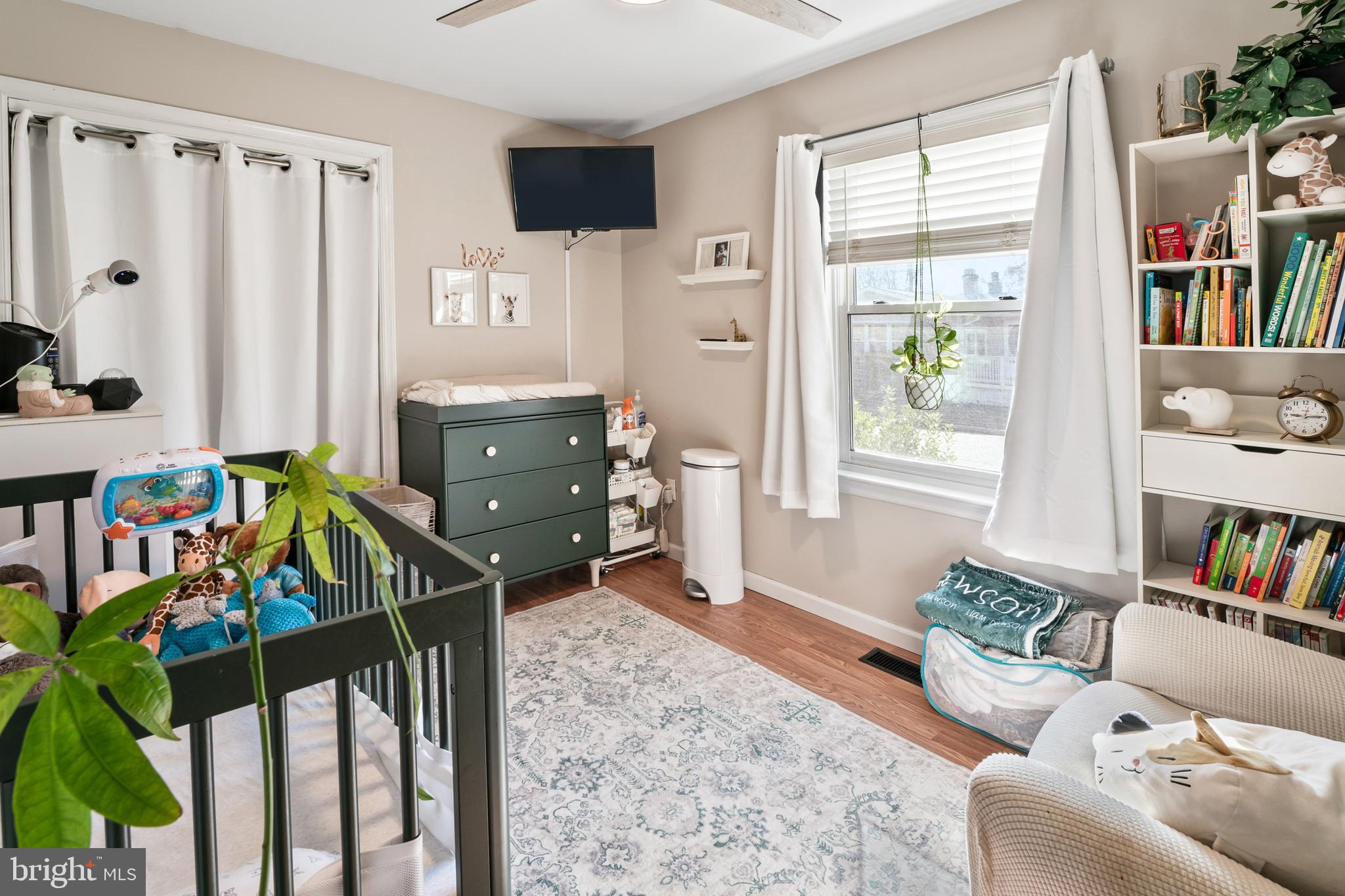 311 Tyler Avenue Carneys Point, NJ 08069 - Photo 16 of 29 a bedroom with furniture and a book shelf