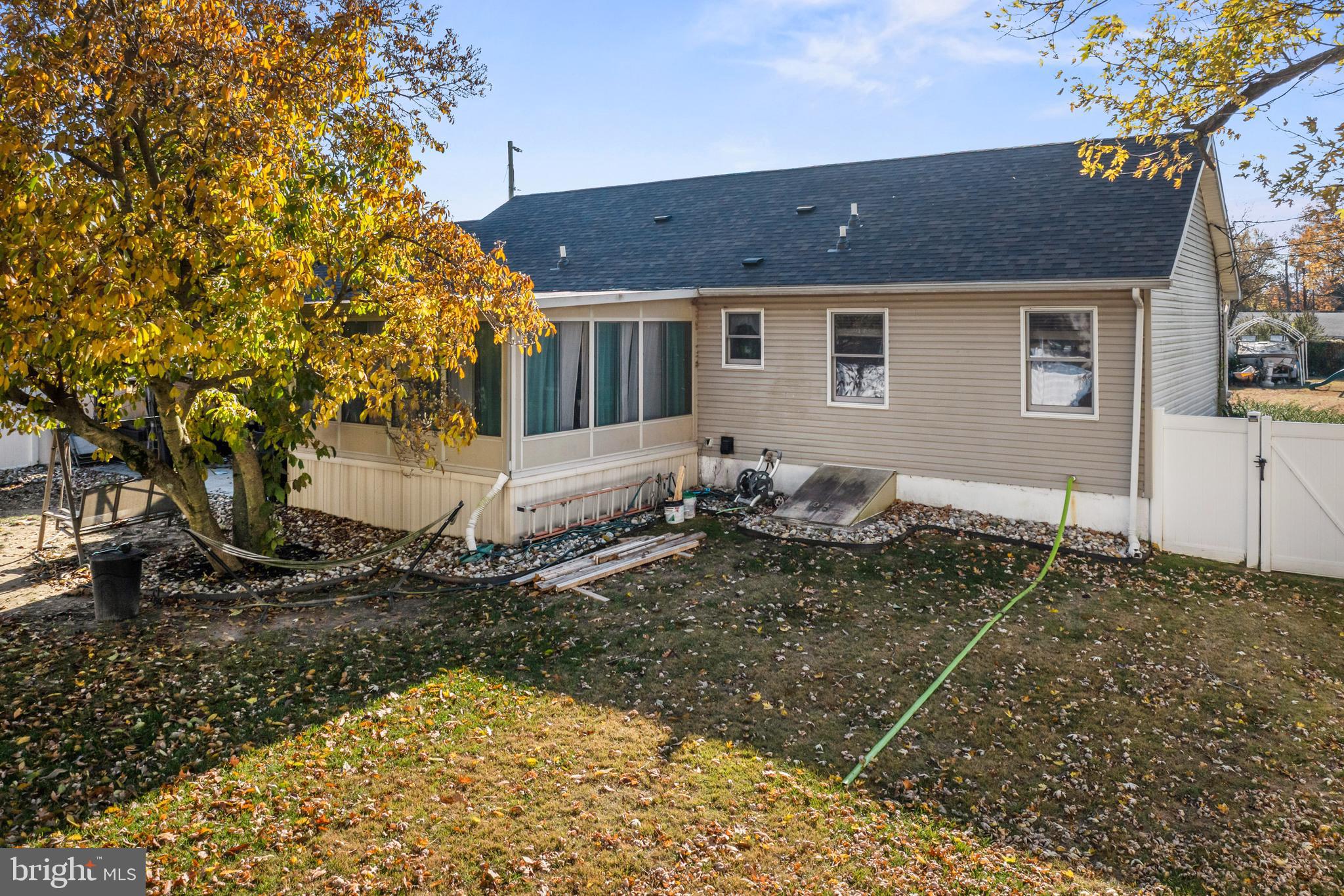 311 Tyler Avenue Carneys Point, NJ 08069 - Photo 26 of 29 a front view of a house with a yard