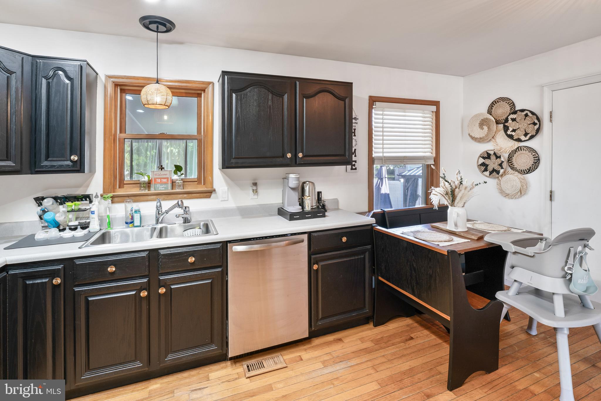 311 Tyler Avenue Carneys Point, NJ 08069 - Photo 6 of 29 a kitchen with a stove sink and cabinets