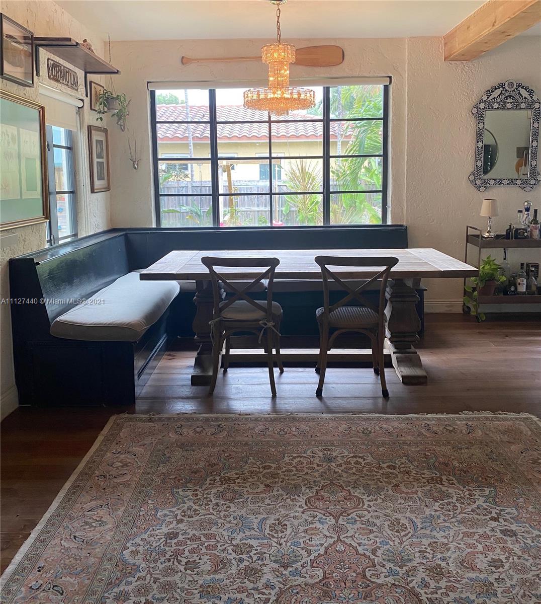 Hollywood Lakes North Lake Hollywood, FL 33019 - Photo 11 of 22 a living room with furniture and a window