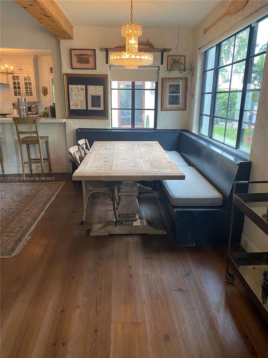 Hollywood Lakes North Lake Hollywood, FL 33019 - Photo 10 of 22 a living room with furniture pool table and a large window