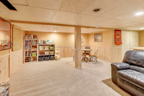 a view of a livingroom with furniture and a couch