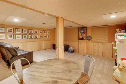 a bedroom with furniture and a bed