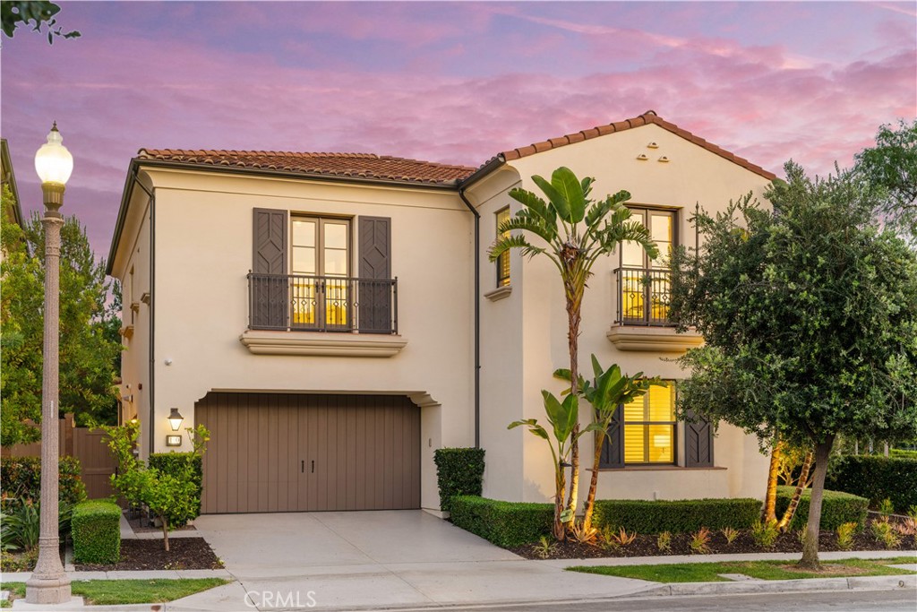 100 Pumpkin Irvine, CA 92620 - Photo 1 of 1 a front view of a house with garden