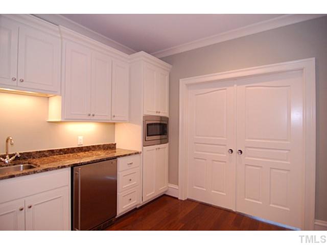 924 Cowper Drive Raleigh, NC 27608 - Photo 9 of 12 Wet bar next to media/bonus room