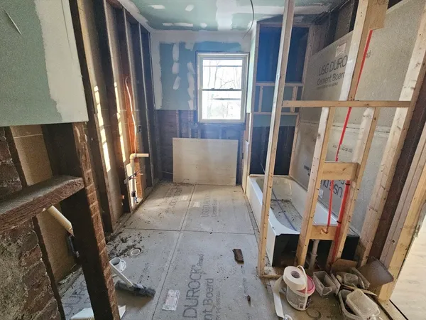 a view of front door with furniture