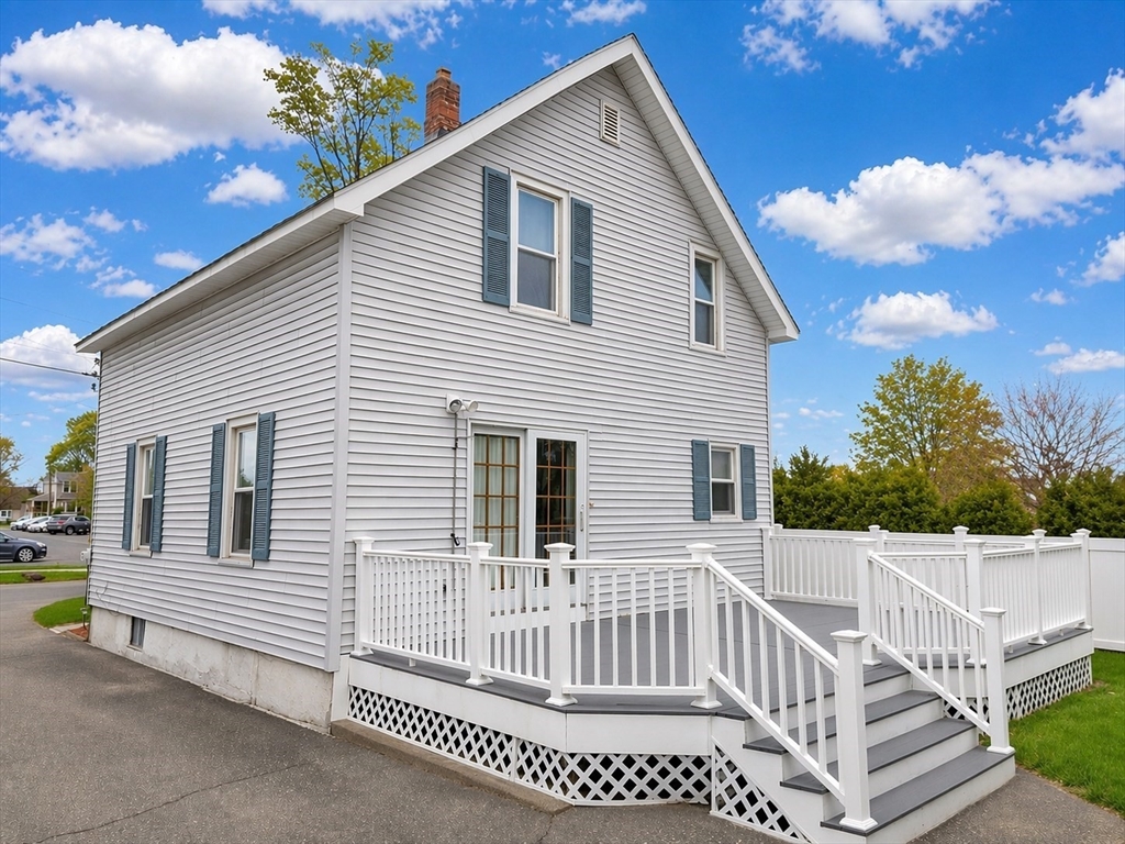 23 York Street West Springfield, MA 01089 - Photo 3 of 7 a view of a house with a wooden deck