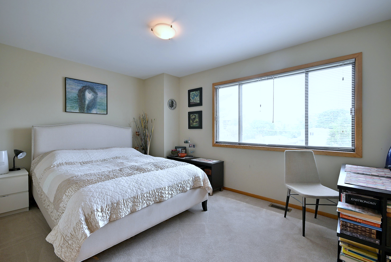 2350 North Sayre Avenue, Unit G Chicago, IL 60707 - Photo 15 of 30 a bedroom with a bed and a window