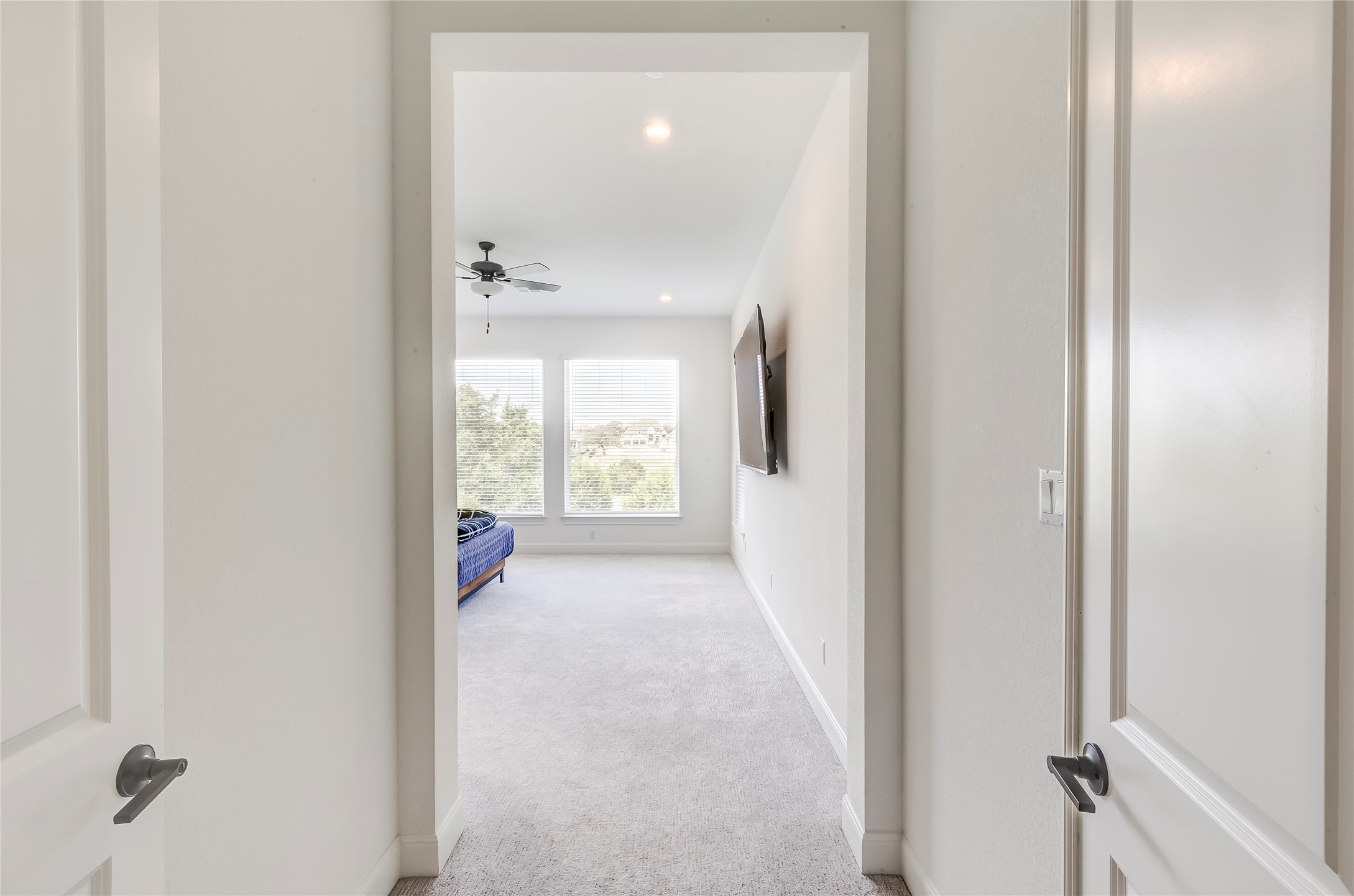 462 Old Stone Road Austin, TX 78737 - Photo 20 of 39 Hallway featuring light colored carpet and recessed lighting