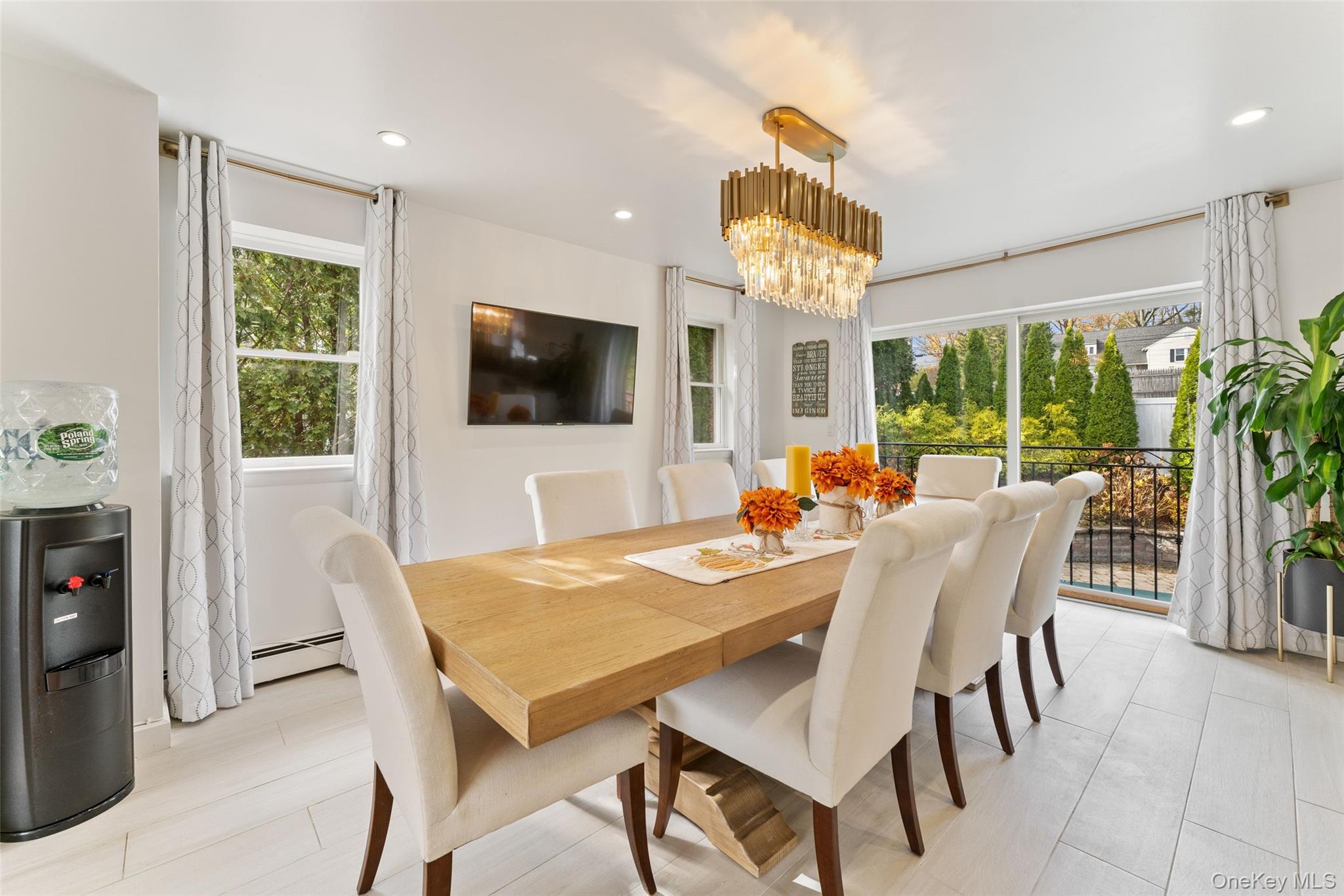 6 Hunting Ridge Road White Plains, NY 10605 - Photo 7 of 32 a view of a dining room with furniture window and outside view