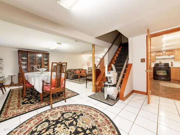 a living room with chairs