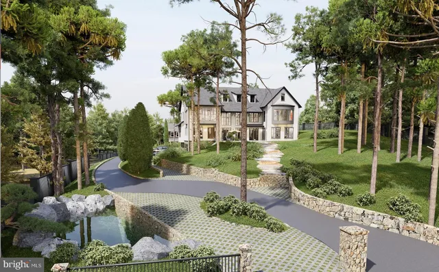 a front view of a house with a yard and potted plants