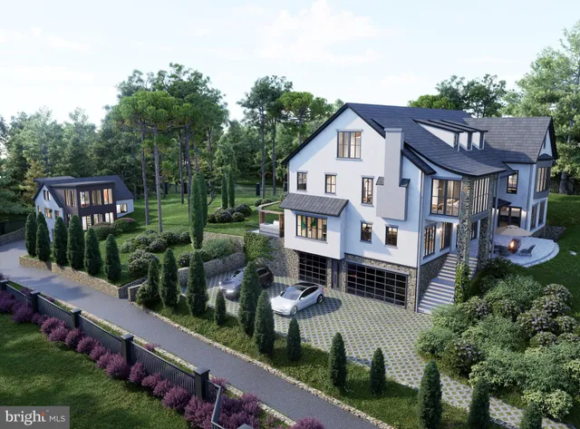 an aerial view of a house with a yard table and chairs