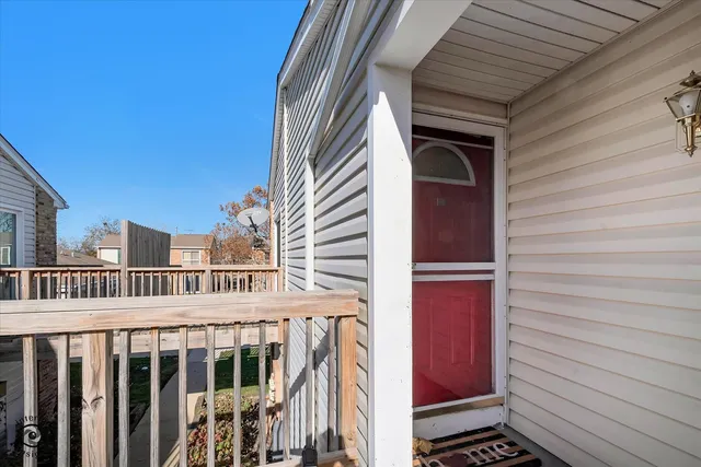 a view of a balcony with a door