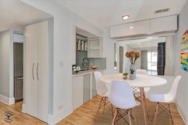 a view of a dining room with furniture