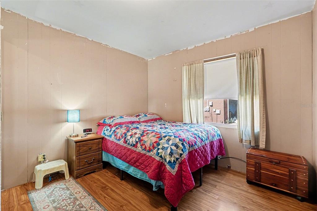 2102 Columbus Drive Brandon, FL 33510 - Photo 20 of 28 a bedroom with a bed and a closet