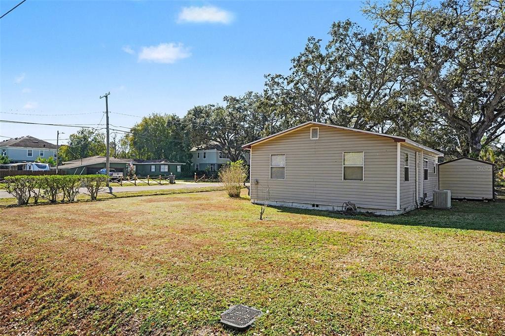 2102 Columbus Drive Brandon, FL 33510 - Photo 28 of 28 a view of a house with backyard and trees
