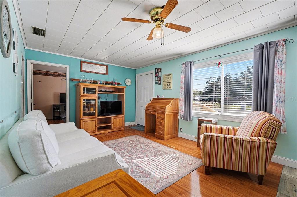 2102 Columbus Drive Brandon, FL 33510 - Photo 9 of 28 a living room with furniture and a rug
