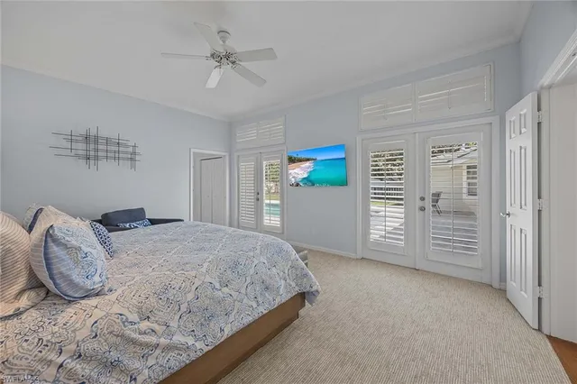 a bedroom with a bed dresser and a window