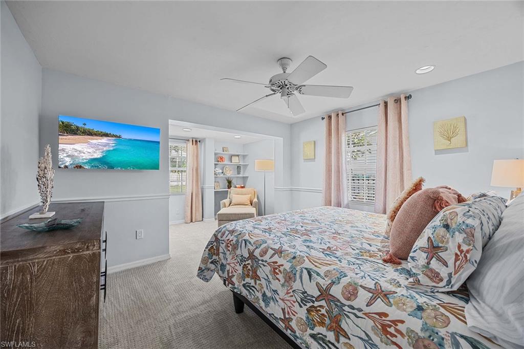 707 Portside Drive Naples, FL 34103 - Photo 24 of 35 a bedroom with a bed and a view of kitchen