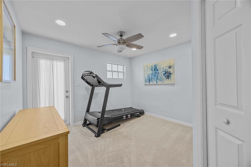 707 Portside Drive Naples, FL 34103 - Photo 27 of 35 a view of a room with gym equipment