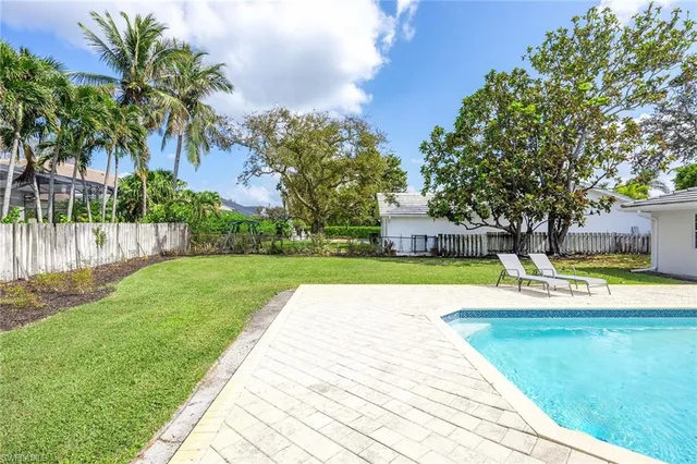 a view of swimming pool with garden