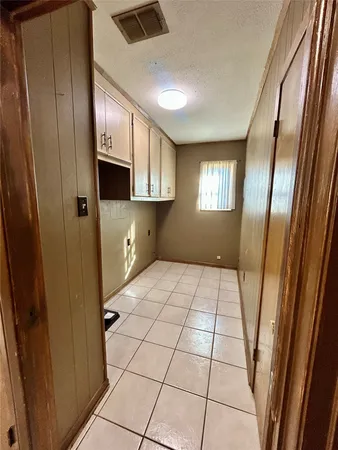 a room with storage and utility