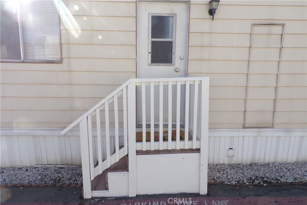 12710 3rd Street, Unit 32 Yucaipa, CA 92399 - Photo 3 of 14 a view of wooden floor and a window