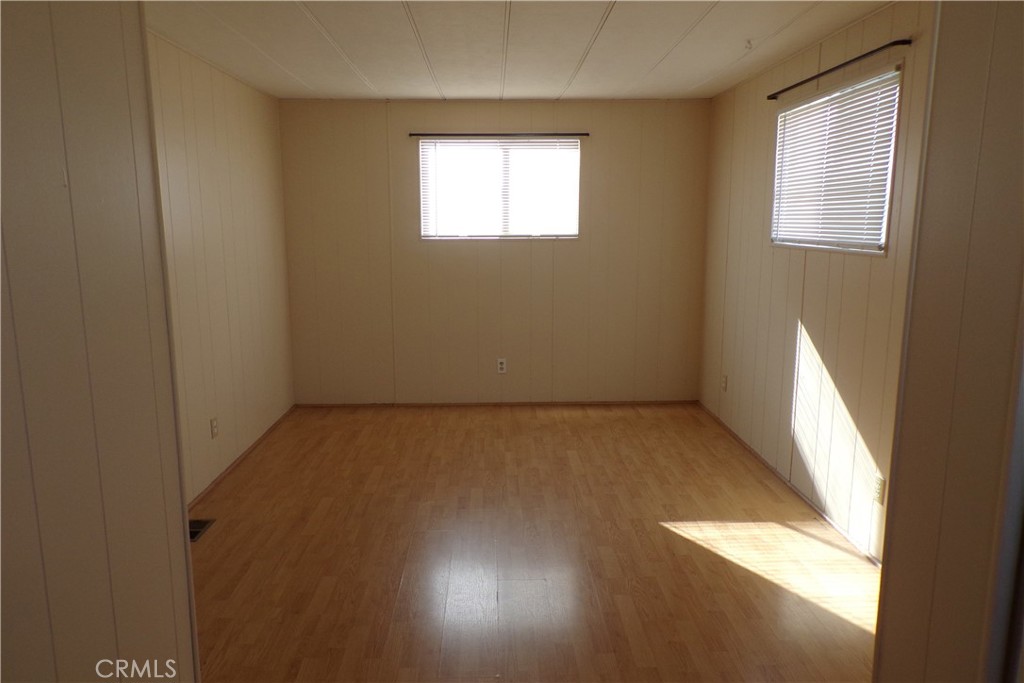 12710 3rd Street, Unit 32 Yucaipa, CA 92399 - Photo 10 of 14 an empty room with a window