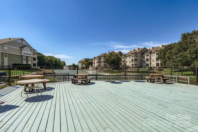 a view of a park with trees and plants