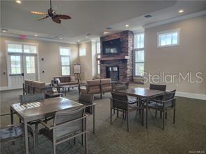 235 Bittern Loop Inverness, FL 34453 - Photo 8 of 10 a view of a dining room with furniture