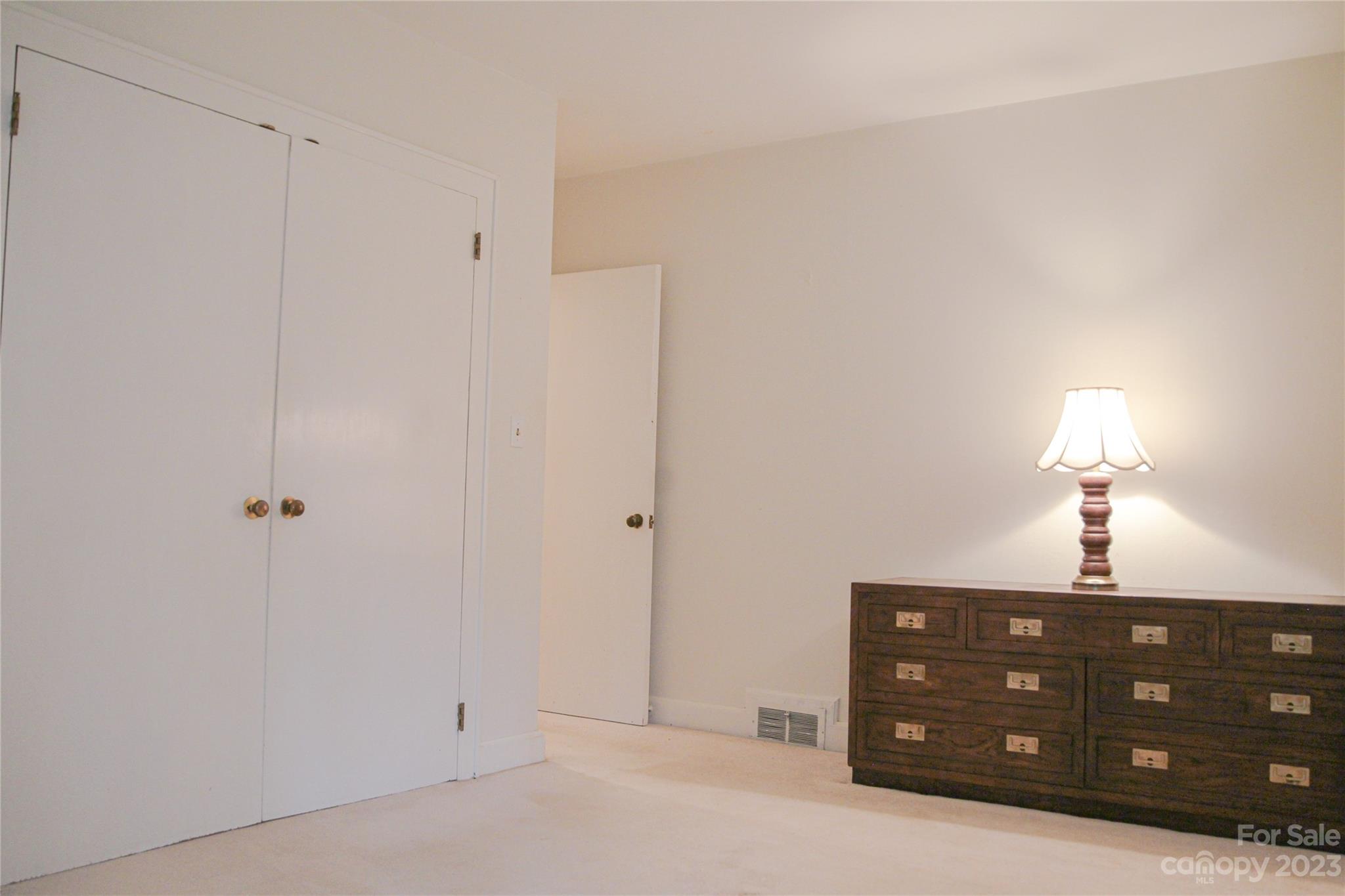 35 Rhododendron Avenue Spruce Pine, NC 28777 - Photo 14 of 37 a view of a dresser with a sink