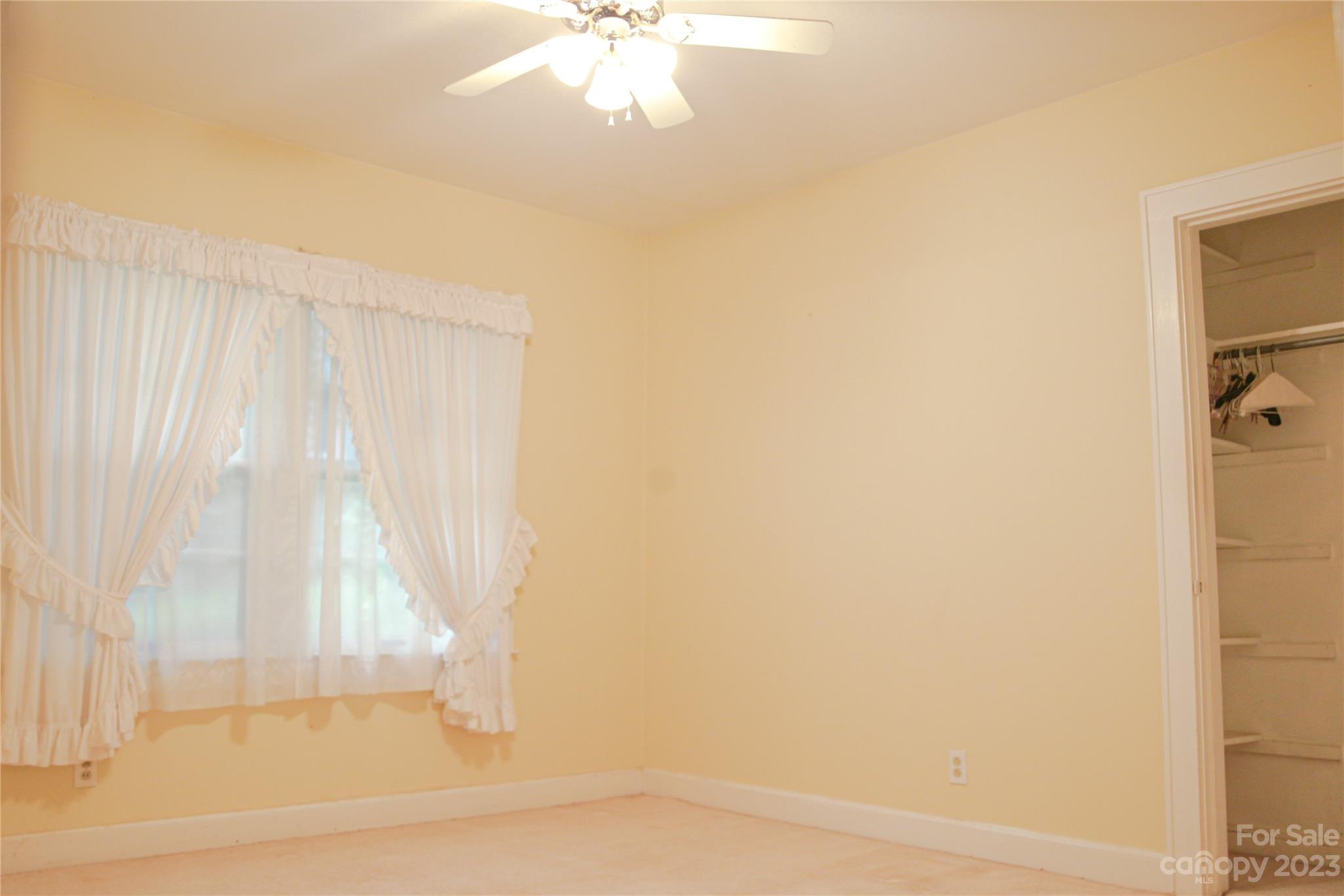 35 Rhododendron Avenue Spruce Pine, NC 28777 - Photo 20 of 37 a bathroom with a bathtub and a shower