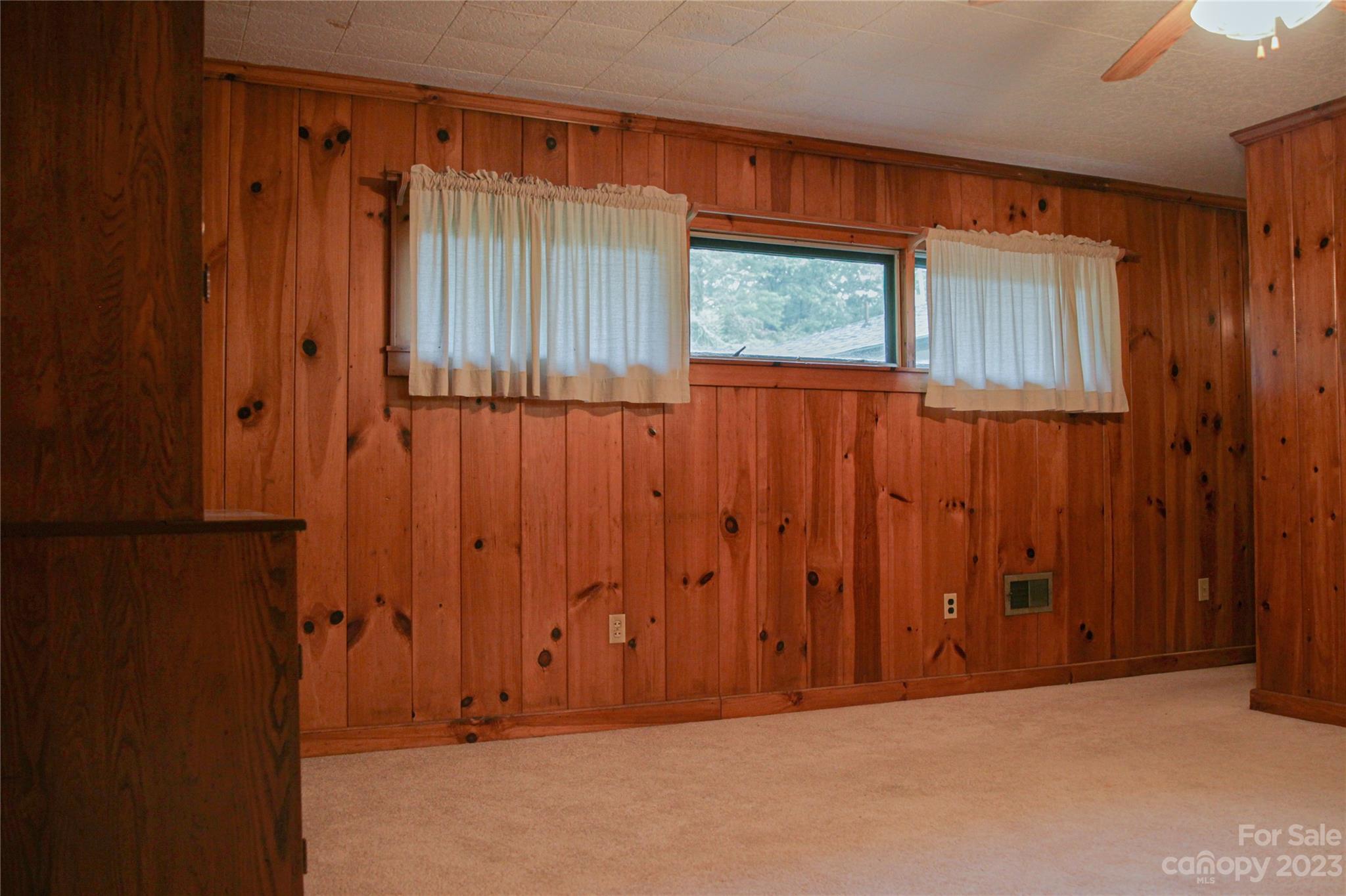 35 Rhododendron Avenue Spruce Pine, NC 28777 - Photo 23 of 37 a view of an empty room with a window